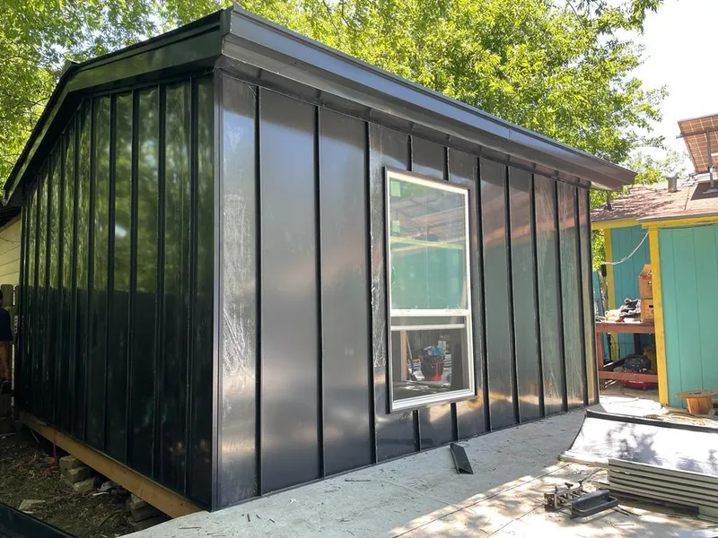 Black standing seam metal wall panels for Roof Inspection in Bay Village