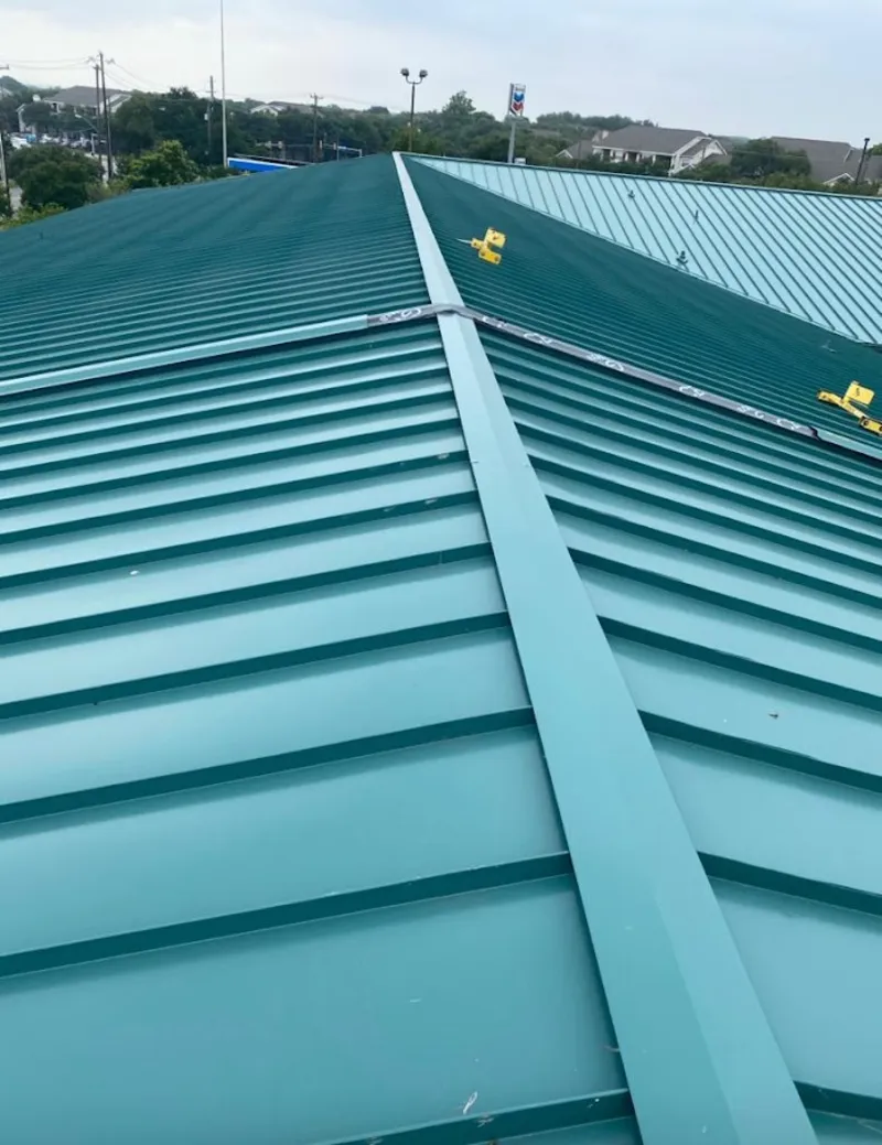Green commercial metal roof ridge and valley for Metal Roof Repair in Bay Village