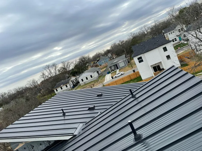 Standing seam metal roof panels with vents for Skylight Repair in Bay Village